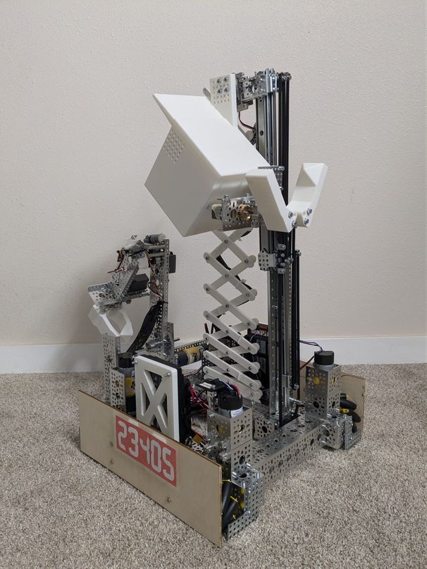 The INTO THE DEEP 2024-25 robot: a scissor lift with a white basket, a linear slide tower and a pyramid claw, marked 23405.